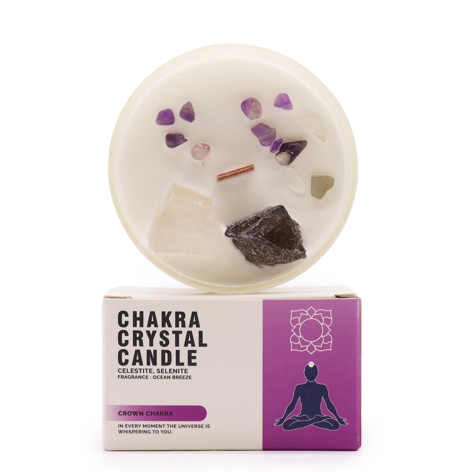 Vela del chakra de la corona colocada sobre su elegante caja, diseñada para conectar con la energía espiritual.